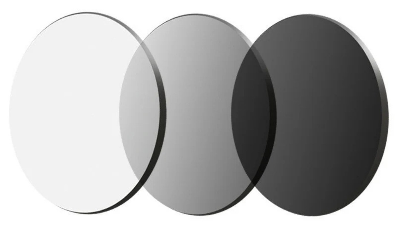 Three lenses showing the photochromic transition from clear through mid tint to dark